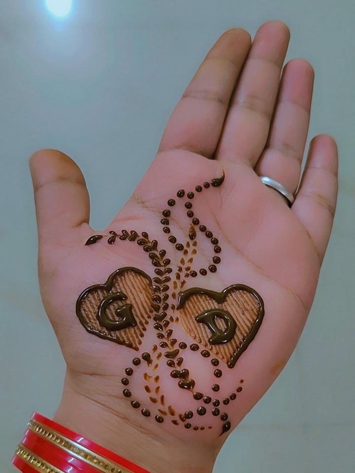 G mehndi designs modern floral initial pattern for brides