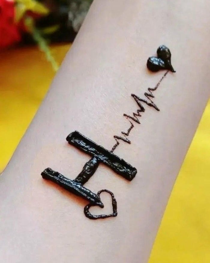 H mehndi design traditional floral alphabet henna