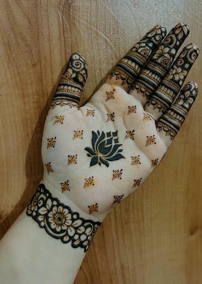 Lotus Mehndi Design Back Hand simple floral henna art