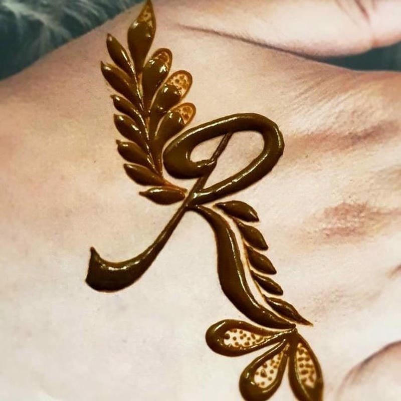 R Mehndi Designs back hand beautiful art