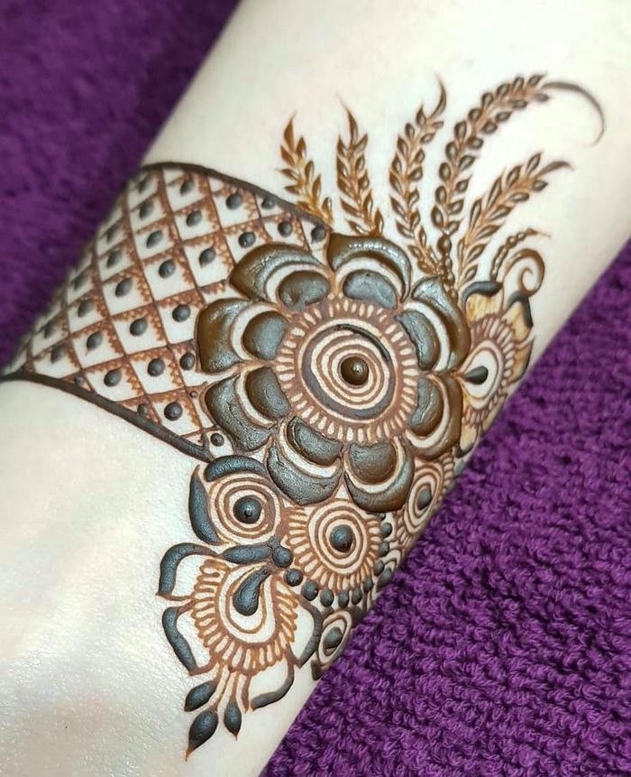 Wrist Mehndi Design elegant motif wrapping the wrist