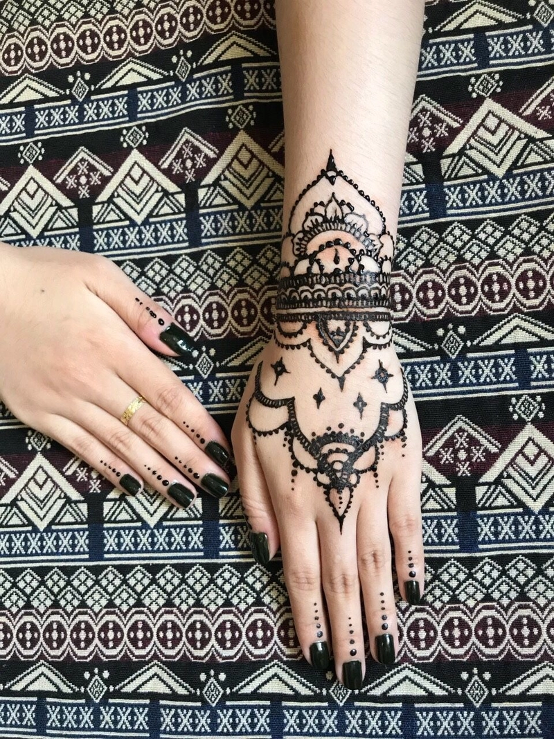 modern wrist tattoo mehndi design