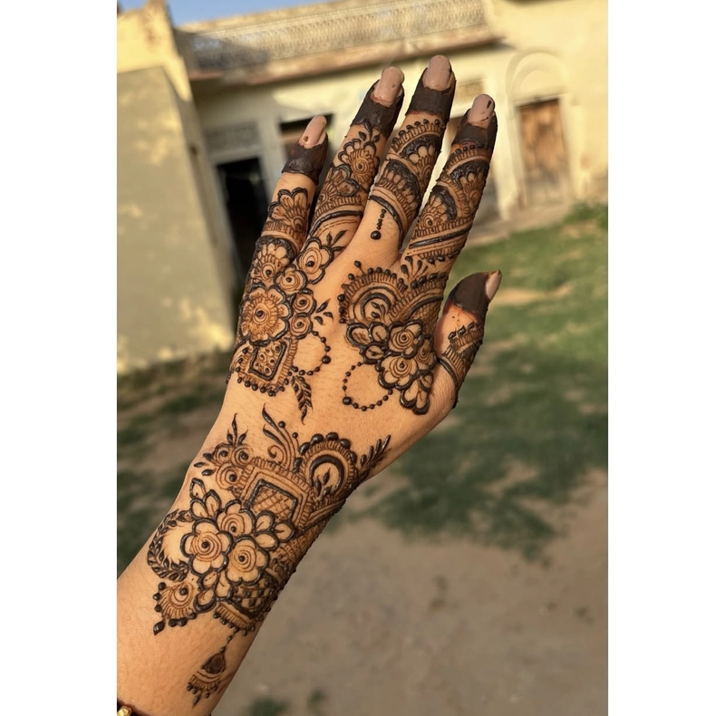 royal half hand mehndi design