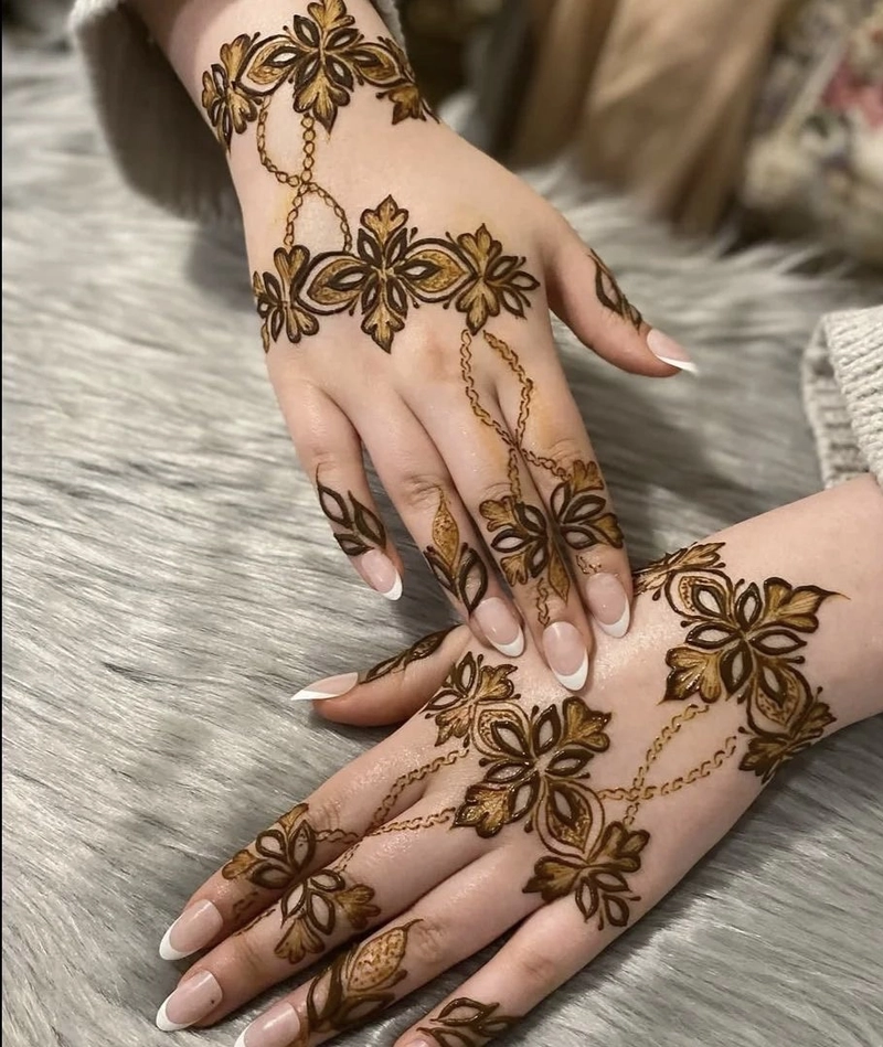 unique back hand mehndi designs
