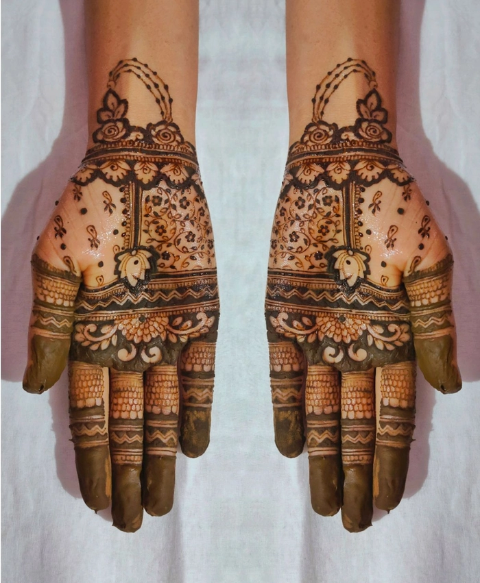 unique mehndi design for front hand
