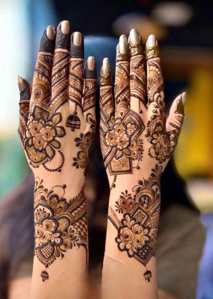 back hand ungli mehndi design