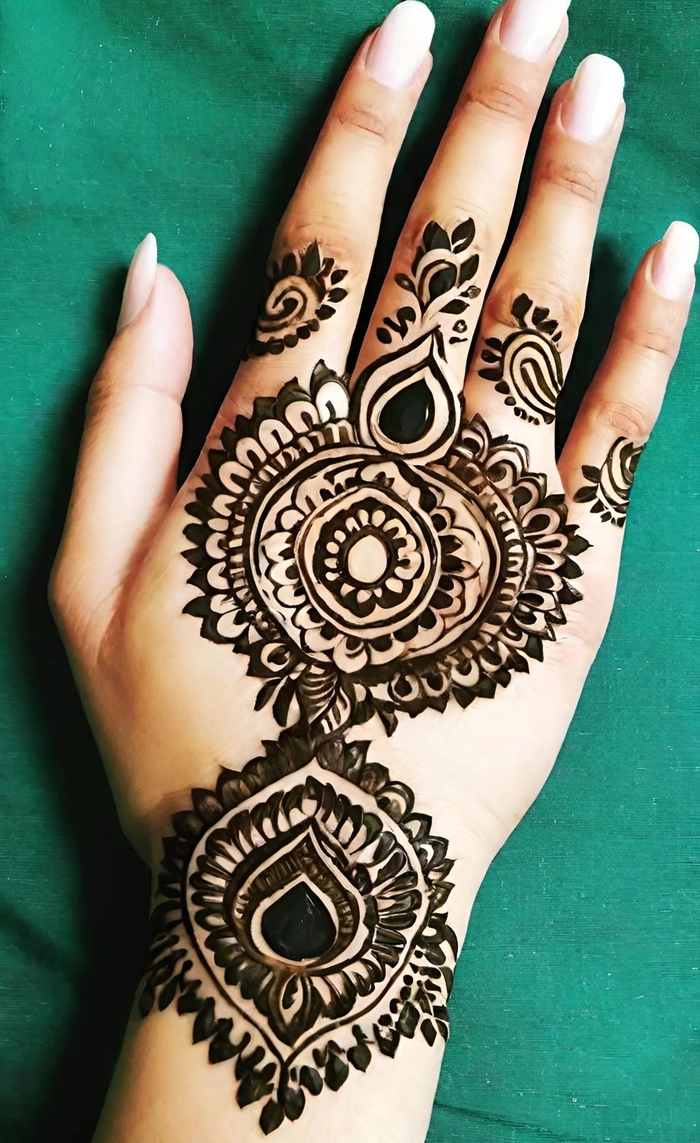 gorgeous mehndi design left hand