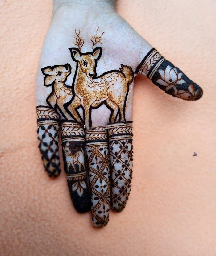 simple cartoon mehndi design front hand