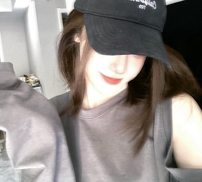 Cool toned cap girl dp portrait