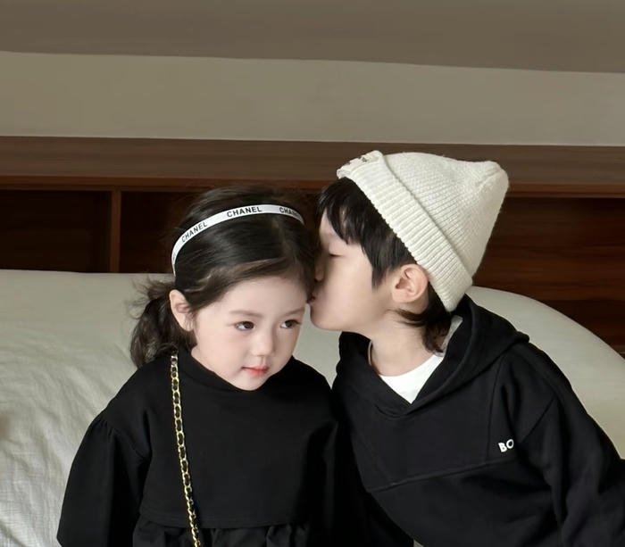 Soft smiles cute baby couple dp