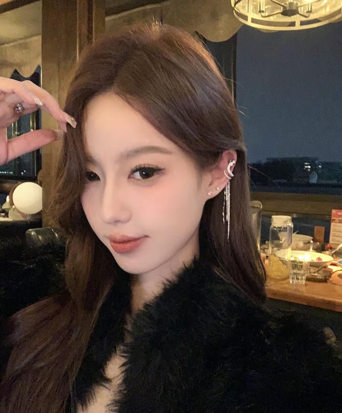 clean aesthetic female earrings photo