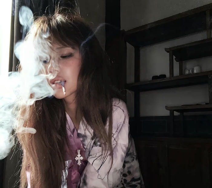 edgy profile in smoking girl dp