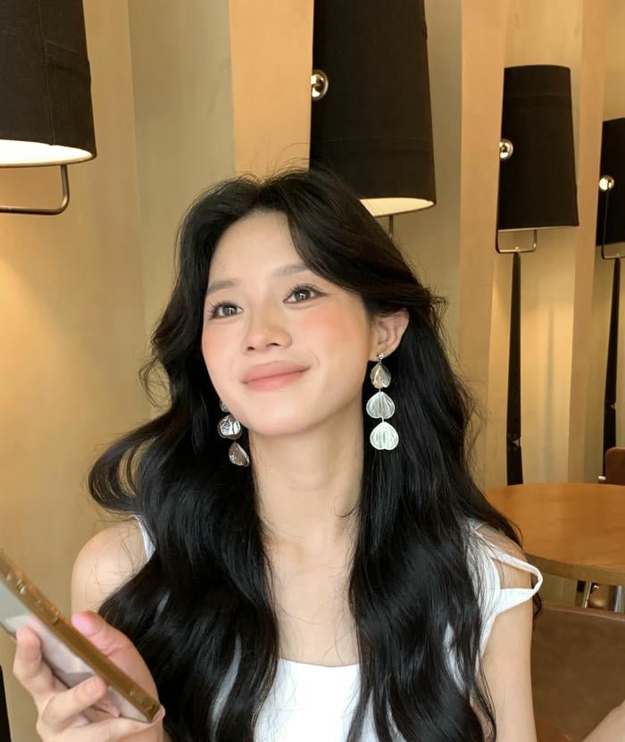 elegant girl dp wearing hoops