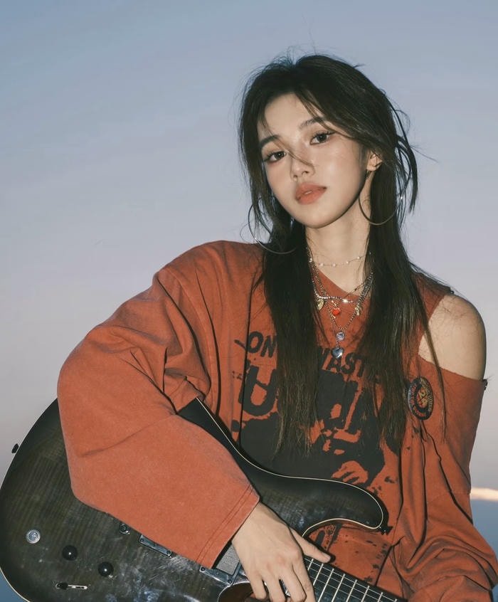 peaceful scene in guitar girl dp