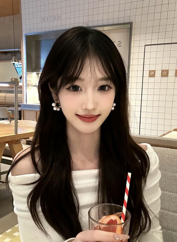 side profile showing earrings