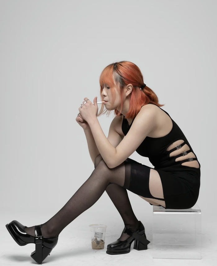 soft haze glow in smoking girl dp