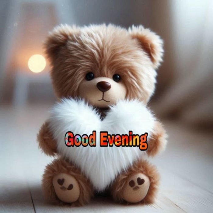 Good evening love image teddy bear holding heart cute gift.