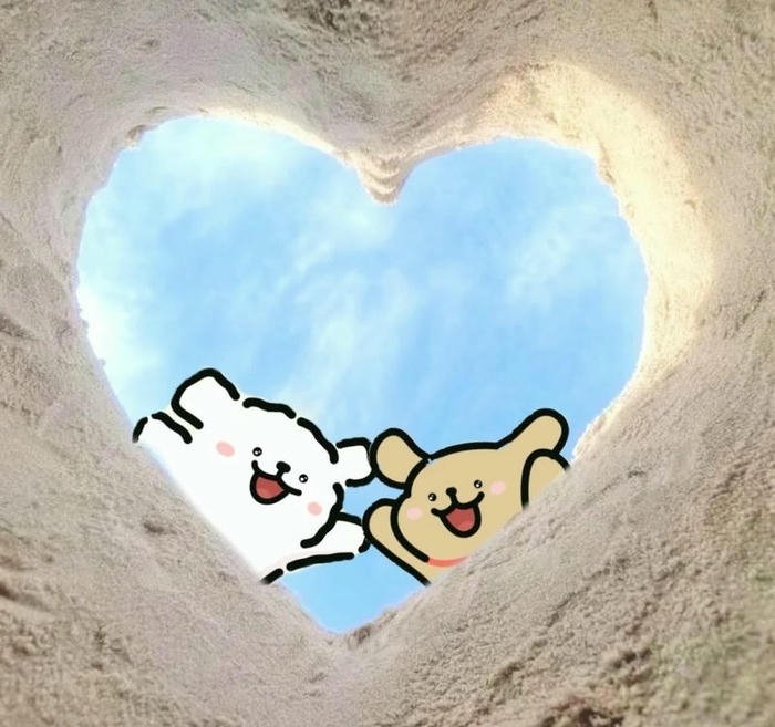 Hands making heart shape against blue sky cloud background.