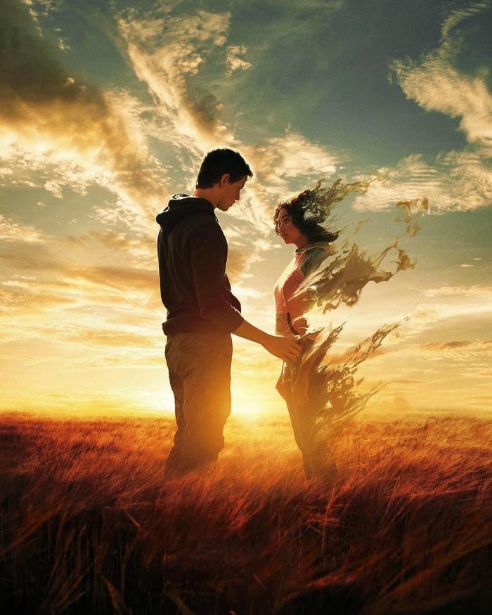 Love breakup images silhouette couple standing apart sunset field.