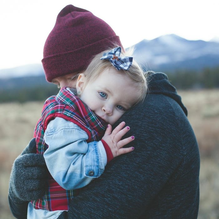Love cute baby images parent hugging winter outdoor cold
