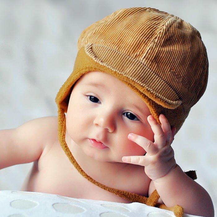 Love cute baby images pilot hat chin on hand