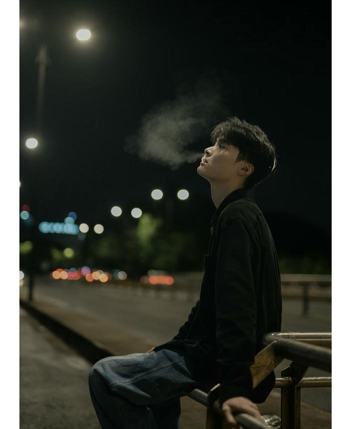 boy dp under lights carrying mood off