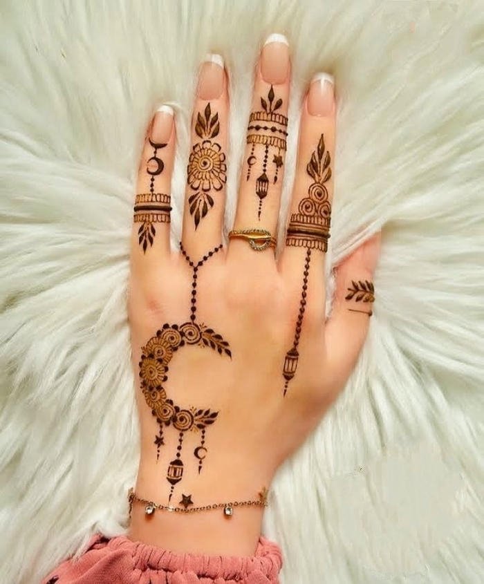 Artistic crescent mehndi pattern with fine lines