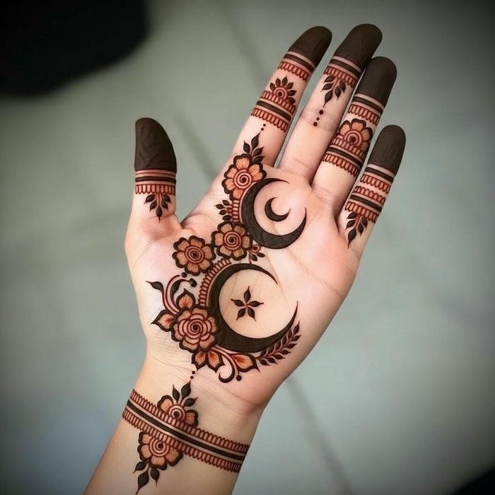 Chand mehndi design enhanced with stylish embellishments
