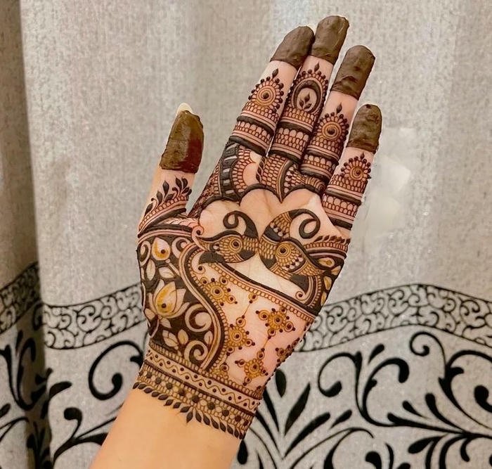 Festive mehndi pattern created for teej