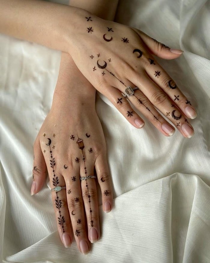 Mehndi design moon intricate motifs creating balanced harmony