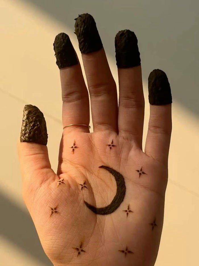 Mehndi design moon refined composition highlighting timeless beauty