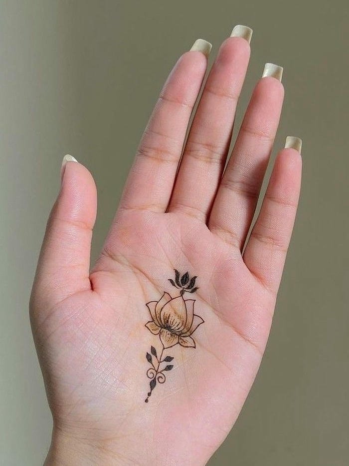 Minimal mehndi design enhancing natural graceful appeal