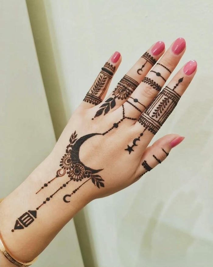 Moon mehndi design artistic patterns showing smooth decorative features