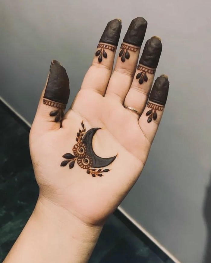 Moon mehndi design elegant patterns with delicate details