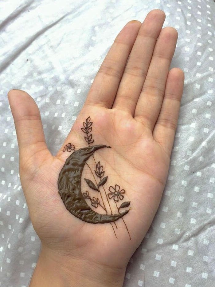 Moon mehndi design flowing shapes creating refined aesthetic impression