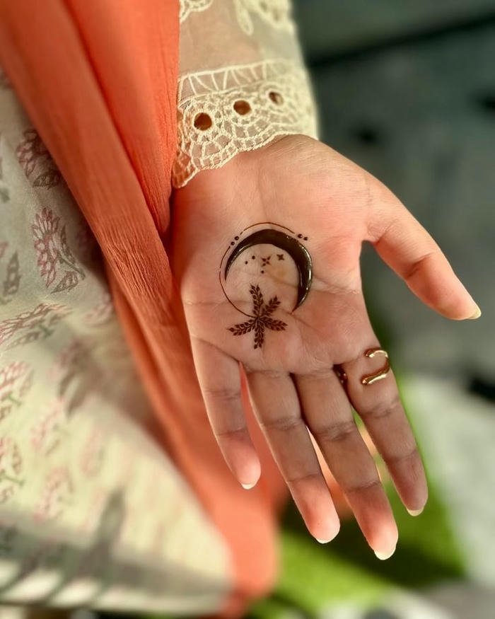 Moon mehndi design refined patterns highlighting artistic creativity