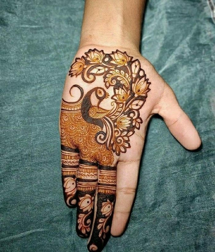 Peacock mehndi design adorned with delicate accents