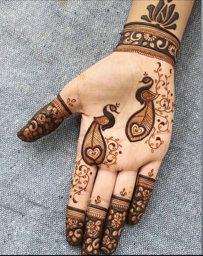 Peacock mehndi design reflecting classic henna artistry