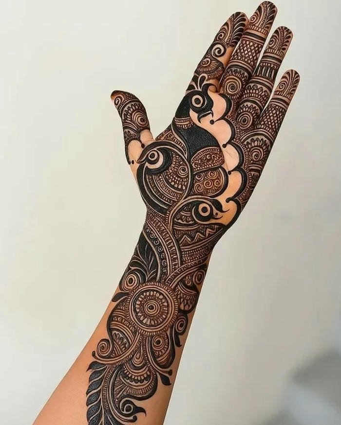 Peacock mehndi design with flowing creative composition