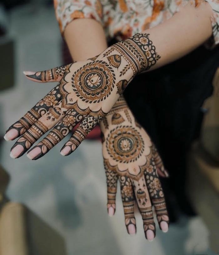 Teej mehndi design featuring bold detailed patterns