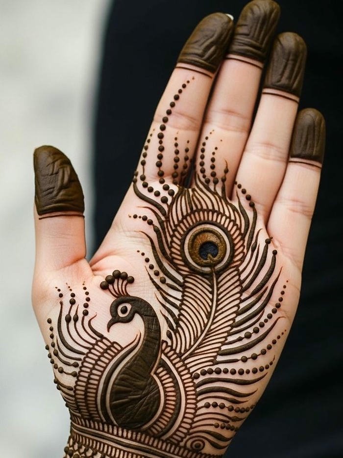 Traditional peacock henna artwork with bold lines